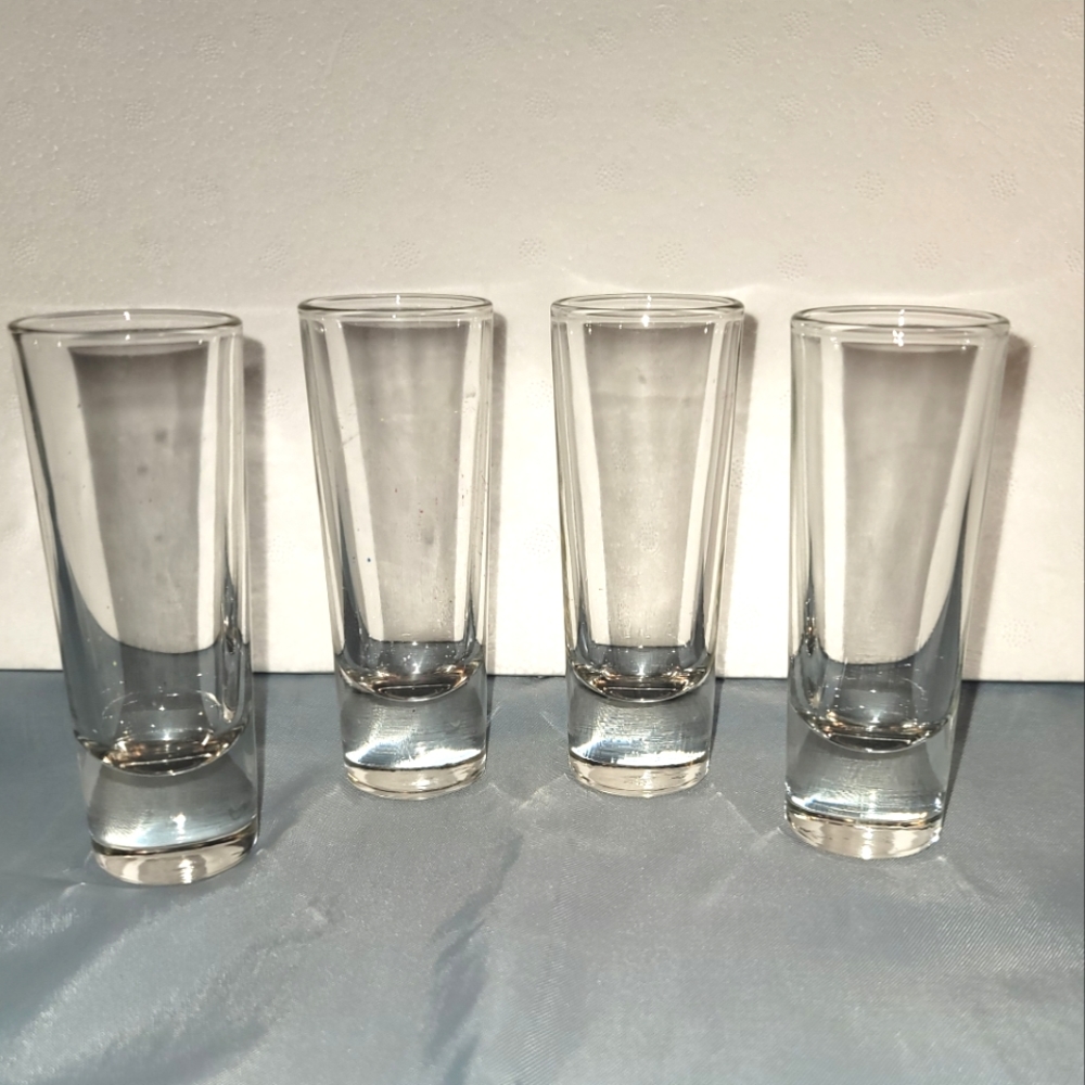 Four clear shooter glasses